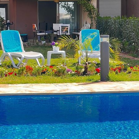 Appartement De Luxe Avec Jardin Vue Sur La Piscine Golf Securise 24H Sur 24 A 5 Minutes De L Aeroport 马拉喀什 外观 照片