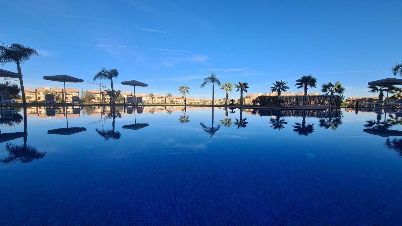 Appartement De Luxe Avec Jardin Vue Sur La Piscine Golf Securise 24H Sur 24 A 5 Minutes De L Aeroport 马拉喀什 外观 照片