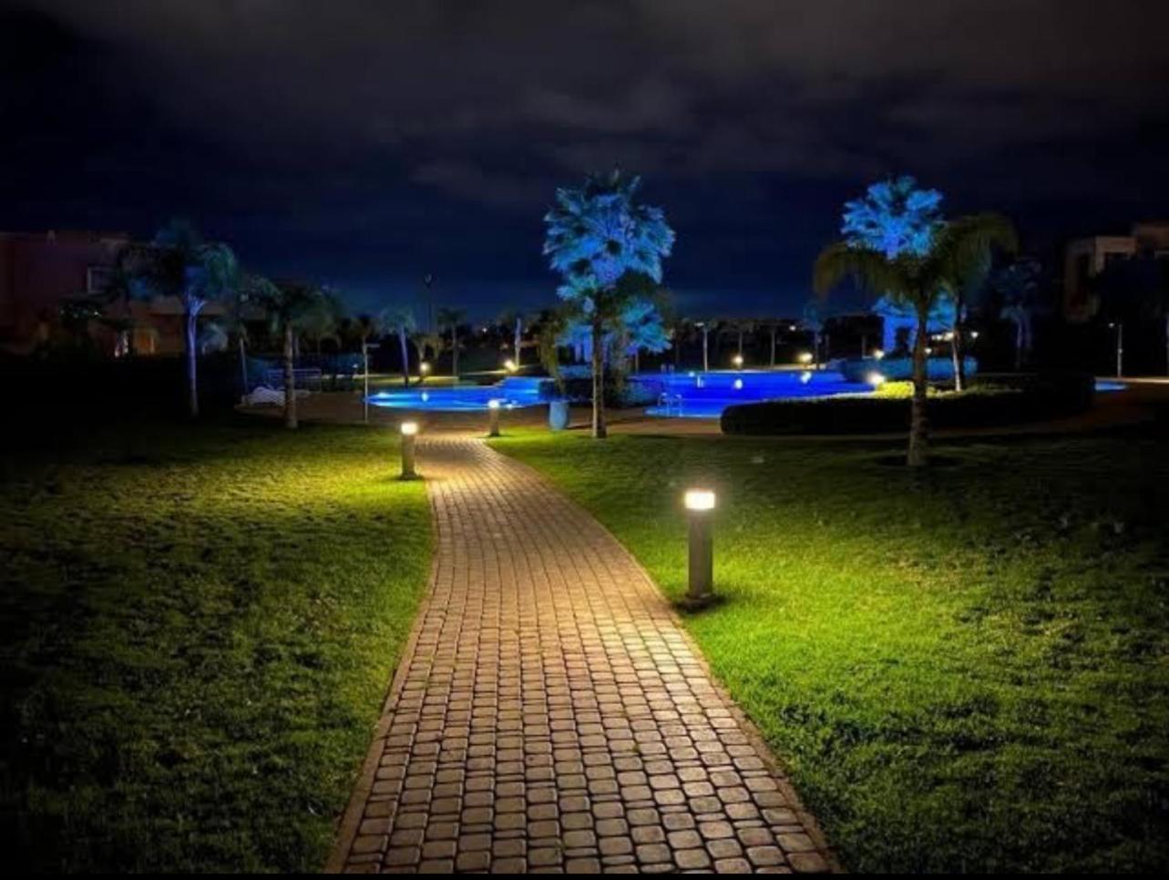 Appartement De Luxe Avec Jardin Vue Sur La Piscine Golf Securise 24H Sur 24 A 5 Minutes De L Aeroport 马拉喀什 外观 照片