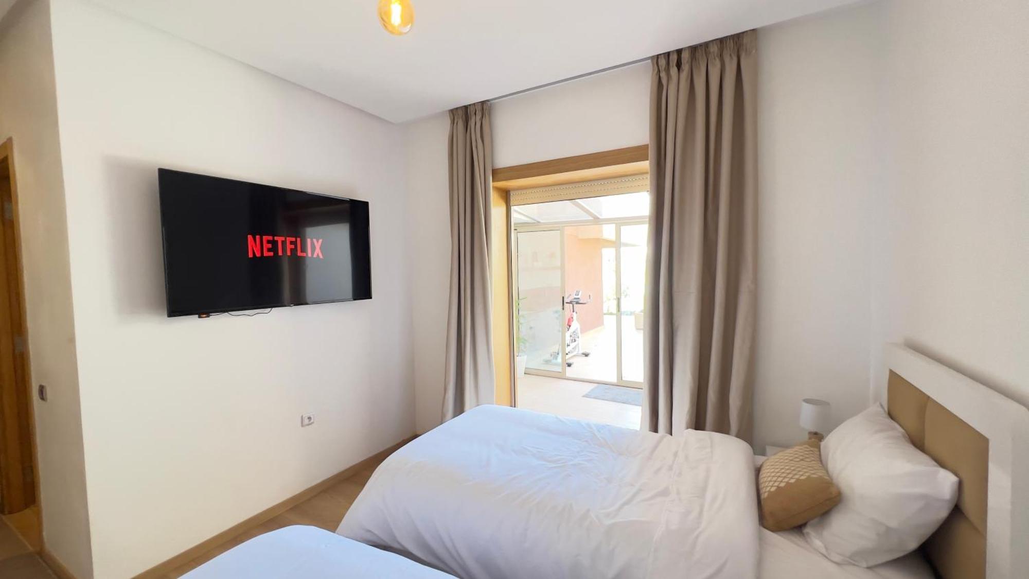 Appartement De Luxe Avec Jardin Vue Sur La Piscine Golf Securise 24H Sur 24 A 5 Minutes De L Aeroport 马拉喀什 外观 照片