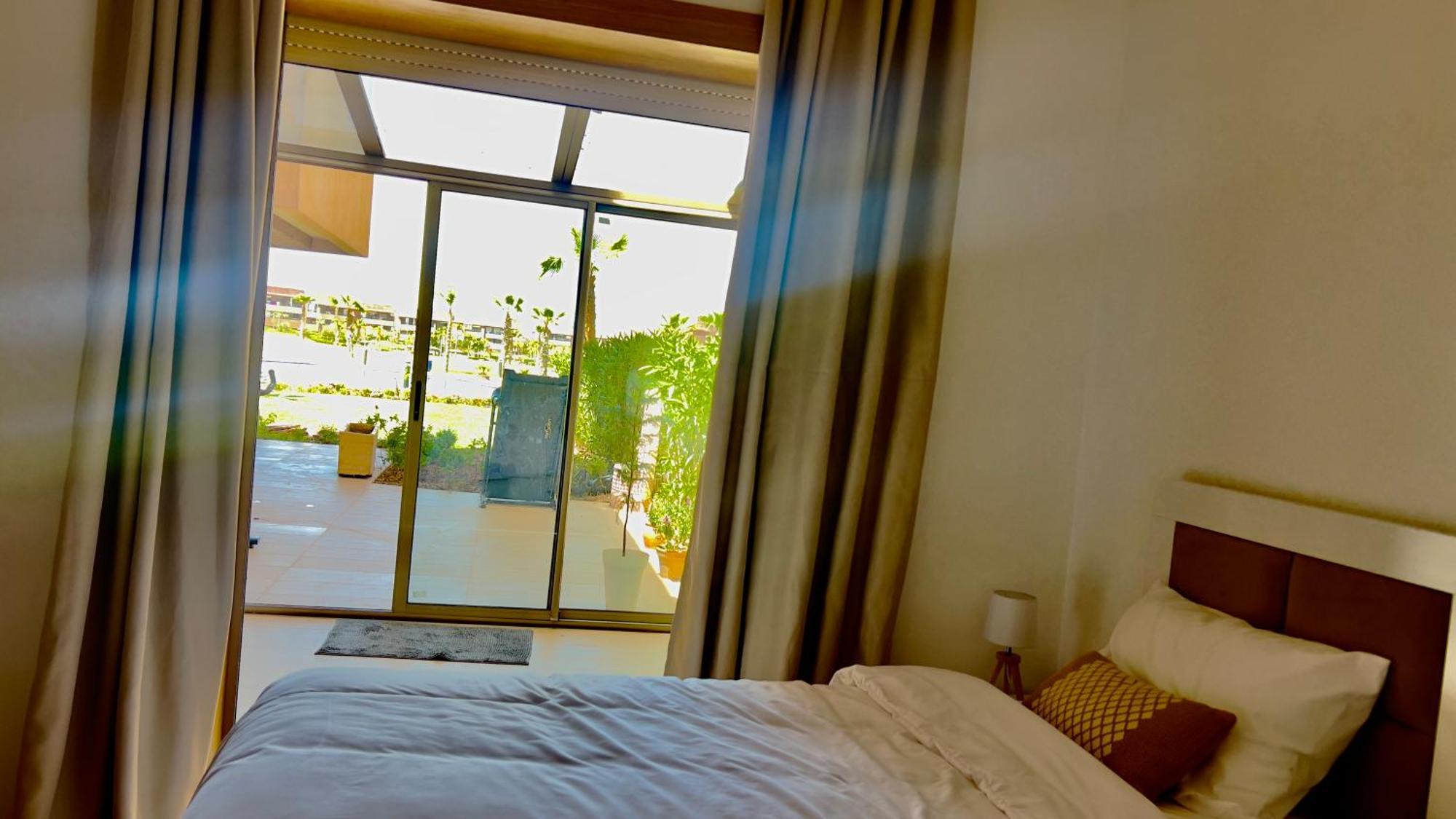 Appartement De Luxe Avec Jardin Vue Sur La Piscine Golf Securise 24H Sur 24 A 5 Minutes De L Aeroport 马拉喀什 外观 照片