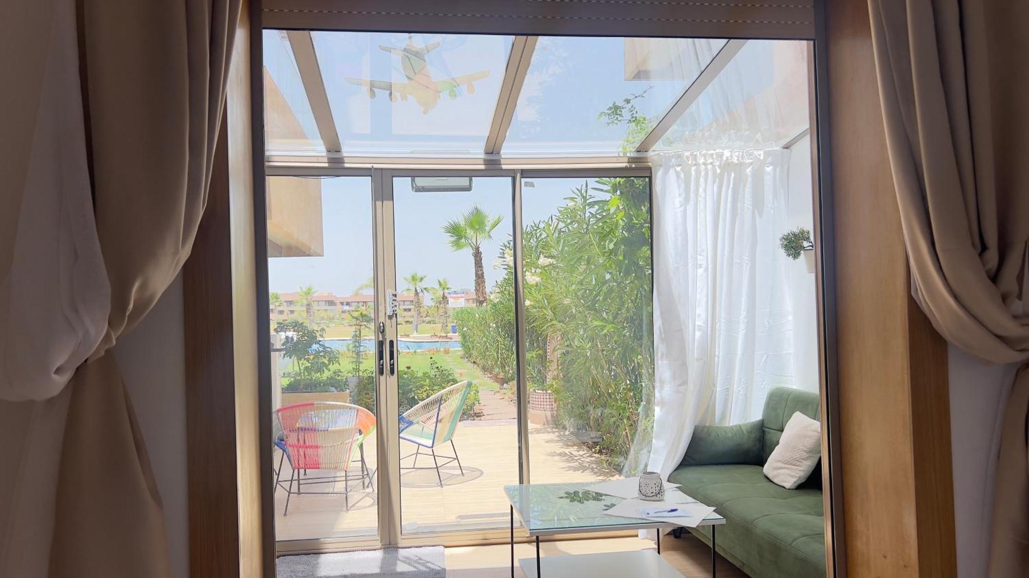Appartement De Luxe Avec Jardin Vue Sur La Piscine Golf Securise 24H Sur 24 A 5 Minutes De L Aeroport 马拉喀什 外观 照片