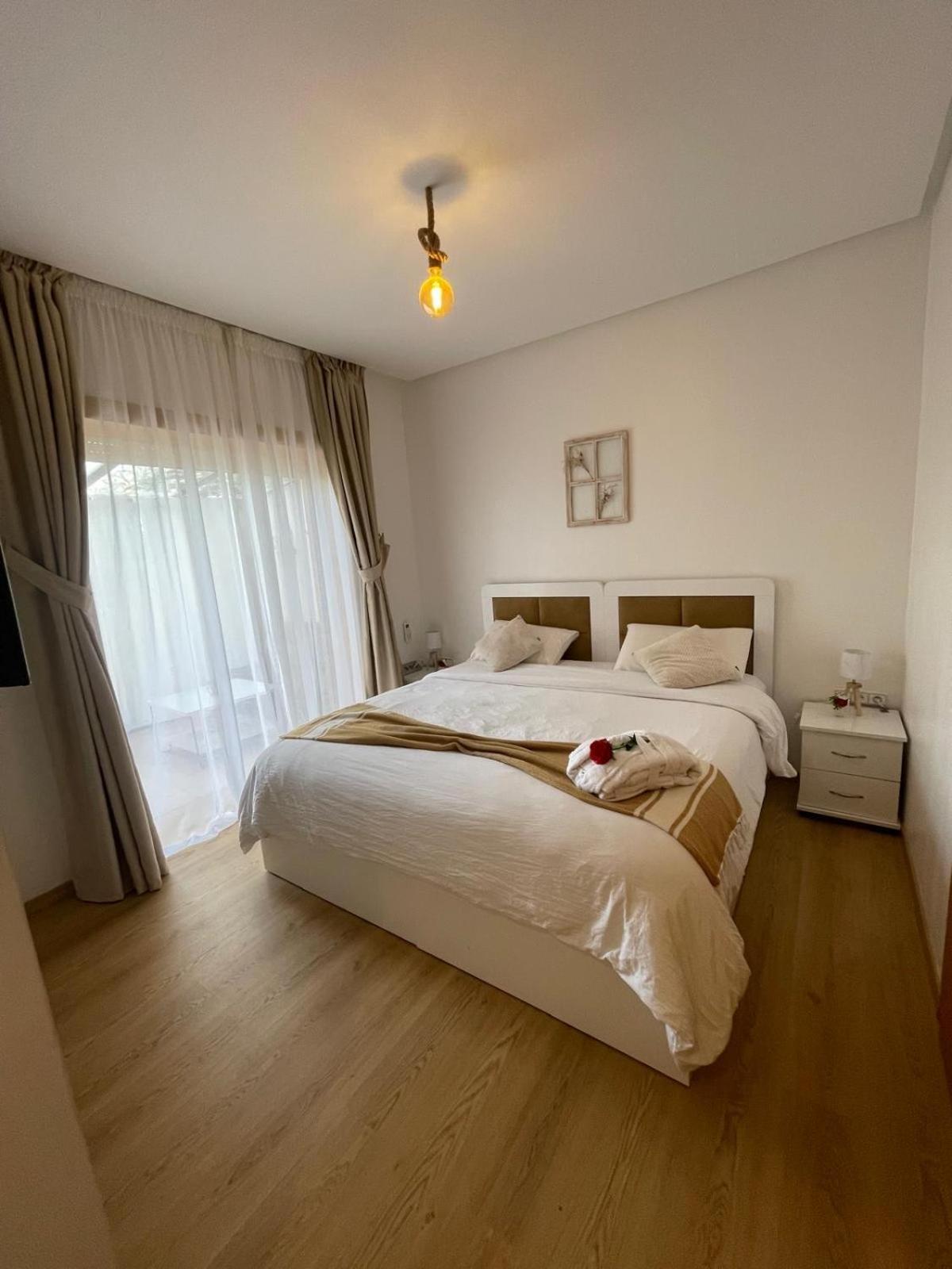 Appartement De Luxe Avec Jardin Vue Sur La Piscine Golf Securise 24H Sur 24 A 5 Minutes De L Aeroport 马拉喀什 外观 照片